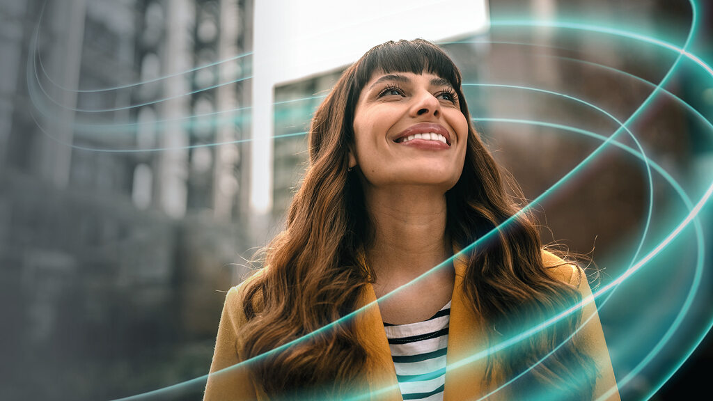 picture of a woman with a flowline new brand visual signature from End to End solution provider Diehl Metering