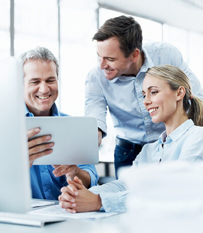 Three workers analyzing information provided by the IZAR@SMART WATER - Water Loss Management Application